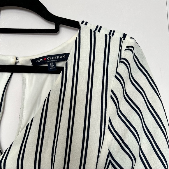 White and black striped shorts romper with ruffle detail - Picture 8 of 12